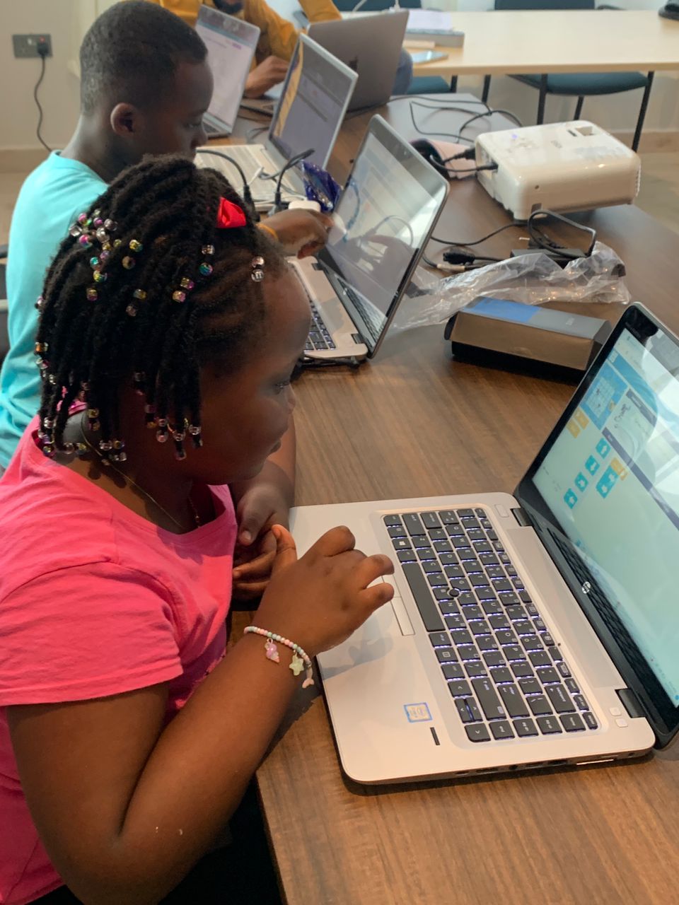 Students focused on coding